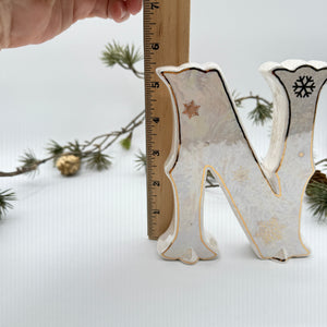 ‘NOEL’ – Iridescent White Ceramic Letter Set with Gold Accents