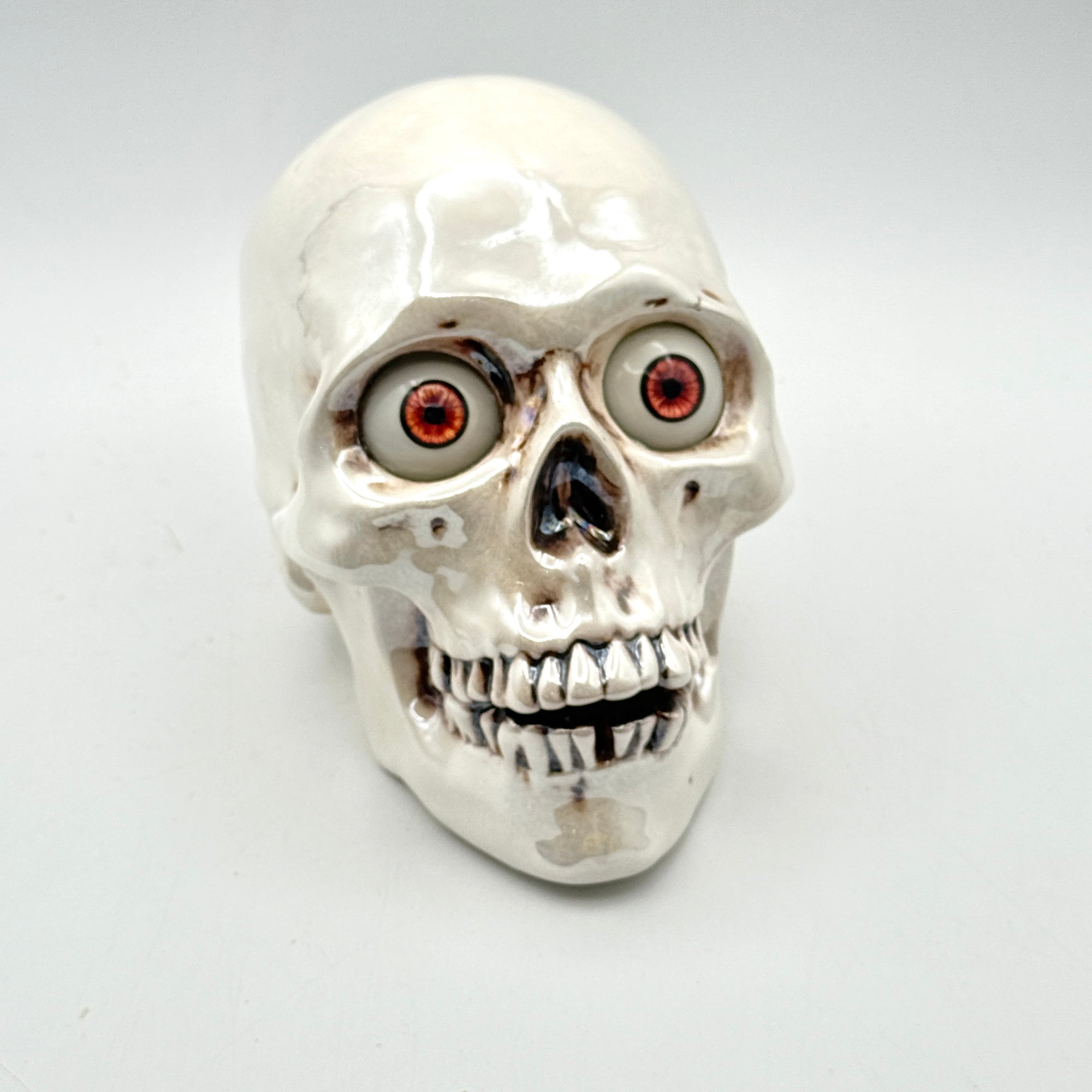 Realistic Ceramic Skull with Color-Changing LED Eyes - Unique Halloween Decor